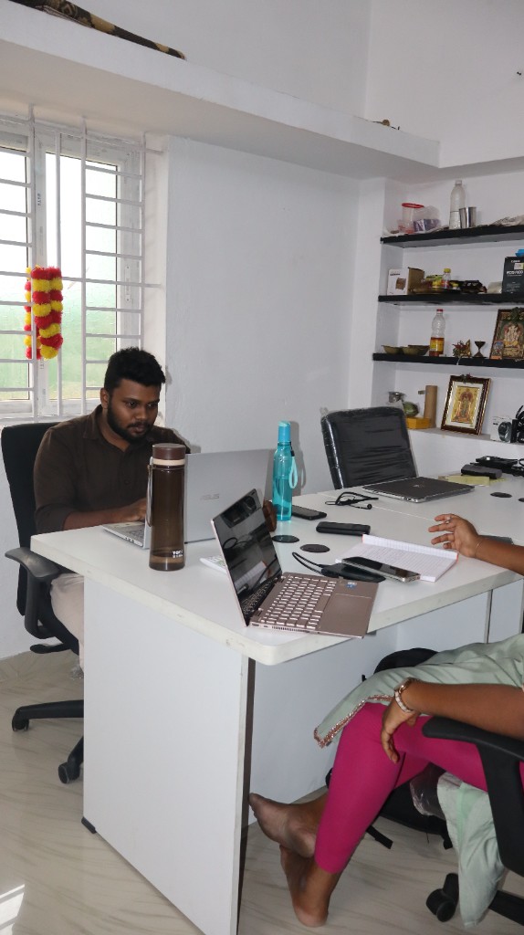 KA Strategist team working at office desk in Coimbatore
